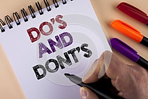 Word writing text Do'S And Don'Ts. Business concept for What can be done and what cannot be knowing right wrong written by Man w
