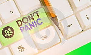 Word writing text Don T Panic. Business concept for to avoid sudden uncontrollable fear or anxiety Keep calm.