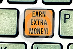 Word writing text Earn Extra Money. Business concept for improve your skills work extra hours or second job Keyboard key