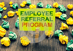 Word writing text Employee Referral Program. Business concept for employees recommend qualified friends relatives Clothespin holdi