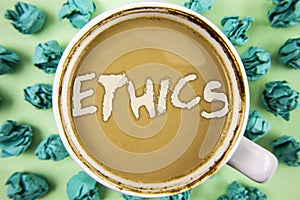 Word writing text Ethics. Business concept for Maintaining equality balance among others having moral principles written on Tea in