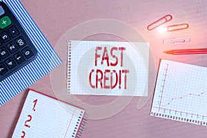 Word writing text Fast Credit. Business concept for Apply for a fast demonstratingal loan that lets you skip the hassles Striped photo