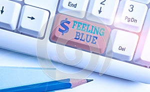 Word writing text Feeling Blue. Business concept for Feeling of desperation because of sadness or missing someone