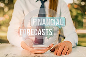 Word writing text Financial Forecasts. Business concept for estimate of future financial outcomes for a company Female