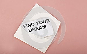 Word Writing Text FIND YOUR DREAM on card on pink background