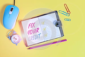 Word writing text Fix Your Credit. Business concept for Keep balances low on credit cards and other credit Locked diary