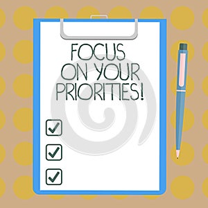 Word writing text Focus On Your Priorities. Business concept for Make a plan based on important things to do Blank Sheet of Bond