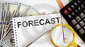 Word writing text FORECAST . Business concept with chart, dollars and office tools