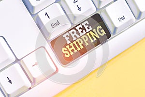 Word writing text Free Shipping. Business concept for Freight Cargo Consignment Lading Payload Dispatch Cartage White pc keyboard