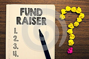 Word writing text Fund Raiser. Business concept for person whose job or task is seek financial support for charity Notebook marker