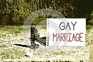 Word writing text Gay Marriage. Business concept for entered into in a civil or religious ceremony of the same sex