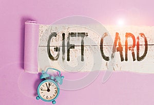 Word writing text Gift Card. Business concept for A present usually made of paper that contains your message Alarm clock
