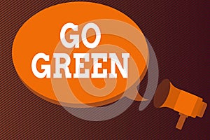 Word writing text Go Green. Business concept for pursue a more environmentfriendly lifestyle and decision Megaphone make