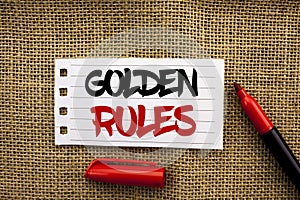 Word writing text Golden Rules. Business concept for Regulation Principles Core Purpose Plan Norm Policy Statement written on Note