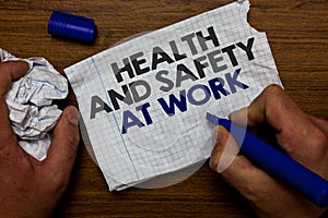 Word writing text Health And Safety At Work. Business concept for Secure procedures prevent accidents avoid danger Hand hold paper