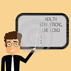 Word writing text Health Stay Strong Live Long. Business concept for Have a healthy life selfcare prevention Man Standing Holding