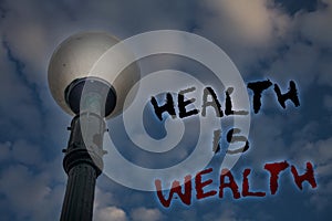 Word writing text Health Is Wealth. Business concept for being in good shape great value Stay healthy eat Healthy Light post blue