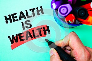 Word writing text Health Is Wealth. Business concept for being in good shape great value Stay healthy eat Healthy Marker pen vario