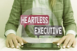 Word writing text Heartless Executive. Business concept for workmate showing a lack of empathy or compassion Business