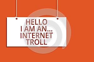 Word writing text Hello I Am An ... Internet Troll. Business concept for Social media troubles discussions arguments Hanging board