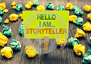 Word writing text Hello I Am... Storyteller. Business concept for introducing yourself as novels article writer Clothespin holding