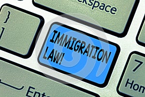 Word writing text Immigration Law. Business concept for National Regulations for immigrants Deportation rules Keyboard