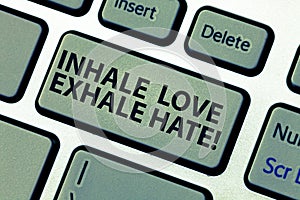 Word writing text Inhale Love Exhale Hate. Business concept for Positive do not be full of resentment Relax Keyboard key