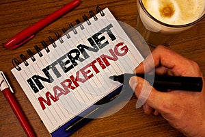 Word writing text Internet Marketing. Business concept for Online Commerce Networking Entrepreneur Entrepreneurship Hand grasp bla