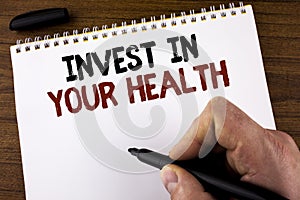 Word writing text Invest In Your Health. Business concept for Spend money in personal healthcare Preventive Tests written by Man o
