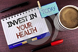 Word writing text Invest In Your Health. Business concept for Spend money in personal healthcare Preventive Tests written on Notep