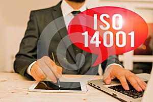 Word writing text Iso 14001. Business concept for a family of standards related to environmental analysisagement Male photo
