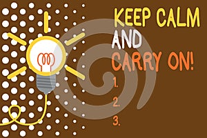 Word writing text Keep Calm And Carry On. Business concept for slogan calling for persistence face of challenge Big idea