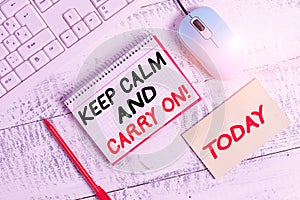 Word writing text Keep Calm And Carry On. Business concept for slogan calling for persistence face of challenge Writing