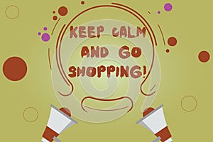 Word writing text Keep Calm And Go Shopping. Business concept for Relax leisure time relaxing by purchasing Two