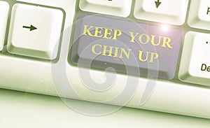 Word writing text Keep Your Chin Up. Business concept for Remain cheerful in difficult circumstances High Spirit.