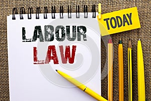 Word writing text Labour Law. Business concept for Employment Rules Worker Rights Obligations Legislation Union written on Noteboo