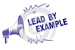 Word writing text Lead By Example. Business concept for Be a mentor leader follow the rules give examples Coach Purple megaphone l