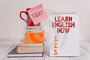 Word writing text Learn English Now. Business concept for gain or acquire knowledge and skill of english language Cup