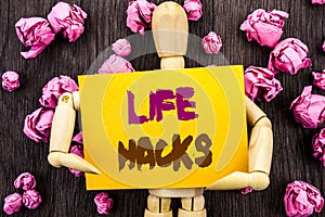 Word, writing, text Life Hacks. Conceptual photo Solution Hacking Hack Trick To Help Efficiency written on Sticky Note Holding By