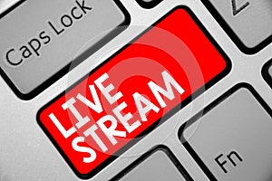 Word writing text Live Stream. Business concept for transmit or receive video and audio coverage over Internet Keyboard red key In
