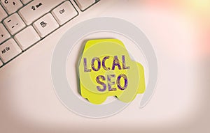 Word writing text Local Seo. Business concept for optimize your website to rank better for a local audience Green note