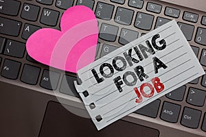 Word writing text Looking For A Job. Business concept for Unemployed seeking work Recruitment Human Resources Ashy computer keyboa