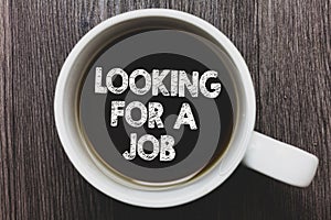 Word writing text Looking For A Job. Business concept for Unemployed seeking work Recruitment Human Resources Black coffee with co