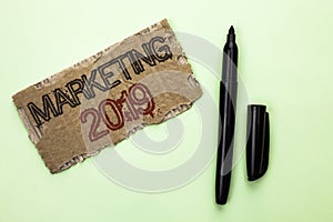 Word writing text Marketing 2019. Business concept for New Year Market Strategies Fresh start Advertising Ideas written on Tear Ca