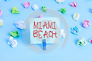 Word writing text Miami Beach. Business concept for the coastal resort city in MiamiDade County of Florida Colored crumpled papers