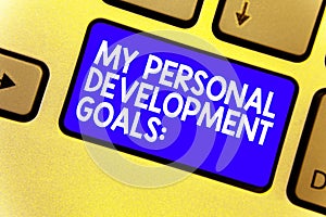 Word writing text My Personal Development Goals. Business concept for Desires Wishes Career Business planning Keyboard blue key In