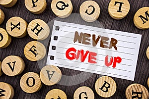 Word, writing, text Never Give Up. Conceptual photo Motivation Quote For Success Achievement Challenge written on tear notobook p