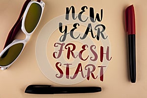 Word writing text New Year Fresh Start. Business concept for Time to follow resolutions reach out dream job written on plain backg