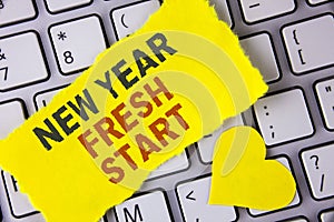 Word writing text New Year Fresh Start. Business concept for Time to follow resolutions reach out dream job written on tear Sticky