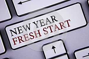 Word writing text New Year Fresh Start. Business concept for Time to follow resolutions reach out dream job written on White Keybo
